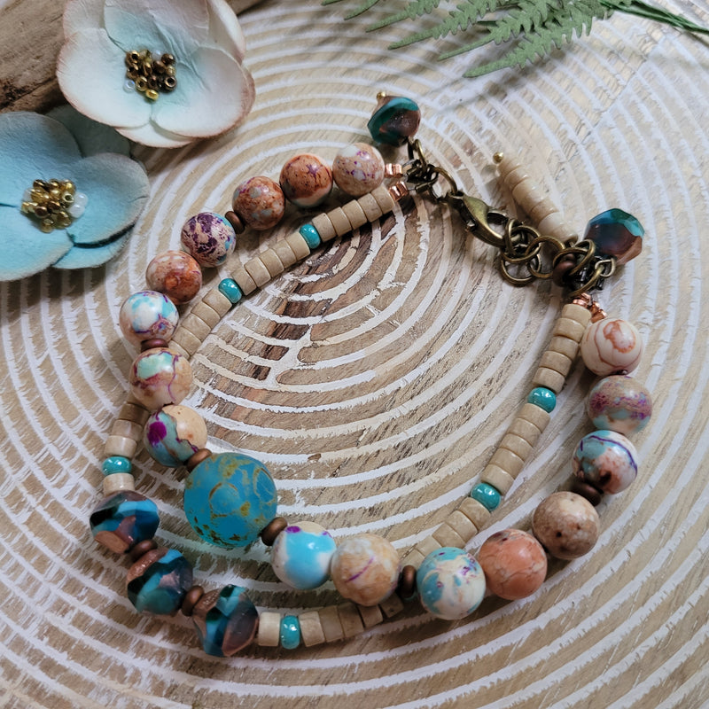 BOHO BRACELET IN BLUE SEA SEDIMENT & REIKI SHELL BEADS