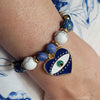 WHITE & BLUE SODALITE BRACELET WITH EVIL EYE CHARM