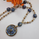 BOHO NECKLACE WITH ARTISAN CERAMIC SUN PENDANT