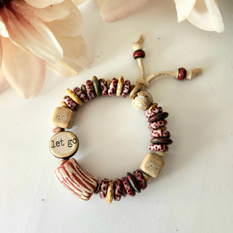 LET GO BUTTERFLY CERAMIC STRETCH BRACELET