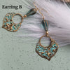 TURQUOISE CZECH GLASS TEAR DROP EARRINGS WITH STAR PATINA CHARMS