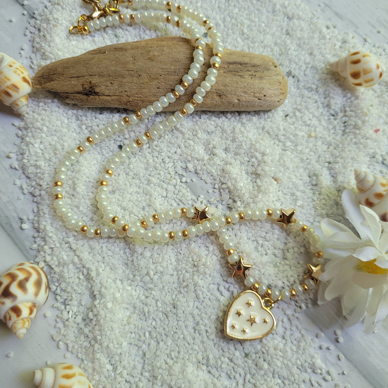 SHIMMERY PEARL & GOLD STAR BRACELET WITH HEART CHARM