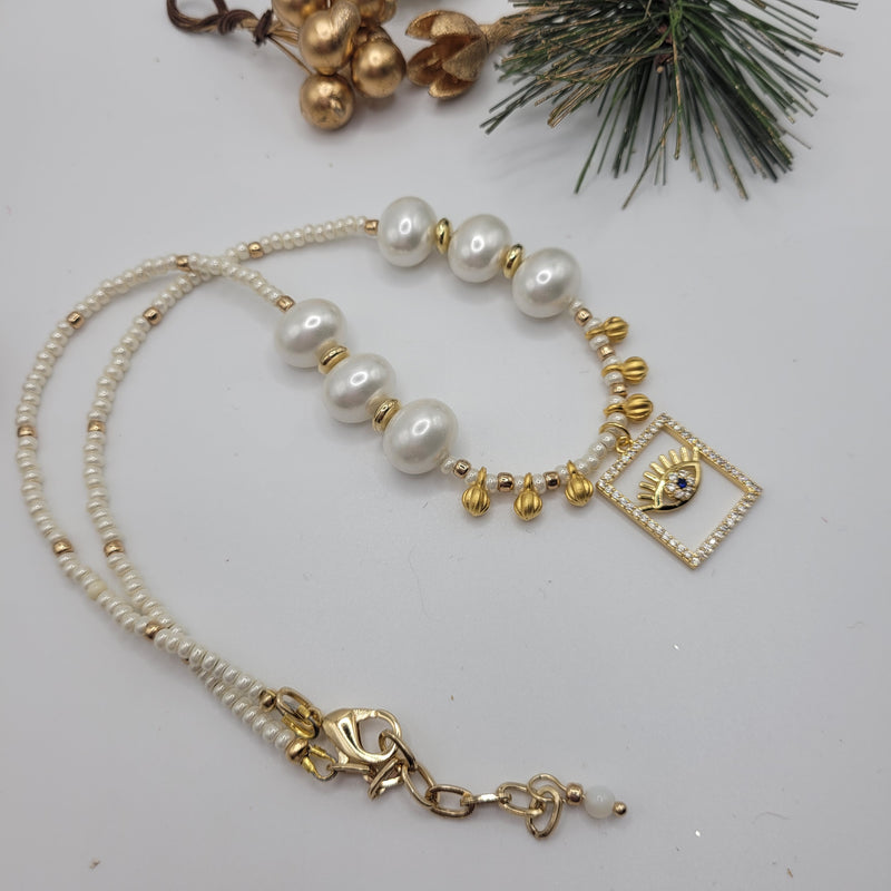 SHELL PEARL NECKLACE WITH WITH 24KT GOLD PLATED EVIL EYE PENDANT